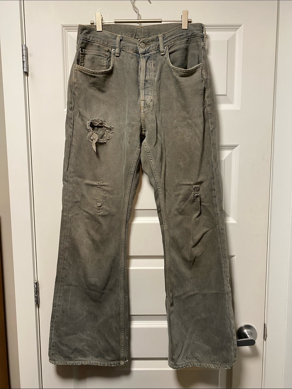 Acne faded gray-blue bootcut jeans with distressing